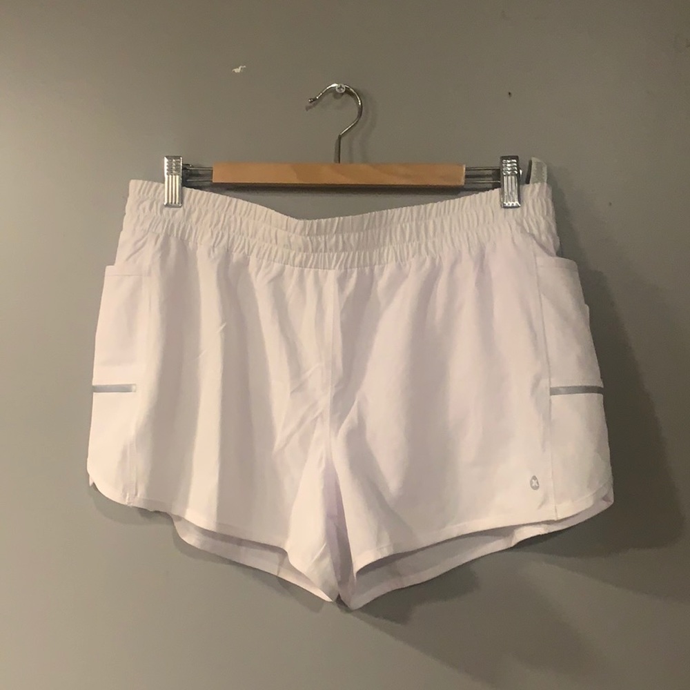 Two pair of workout shorts. New with tags.